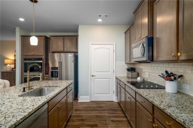 This amazing home with beautiful mountain views is nestled in a on The Highlands Course at Lake Arrowhead in Georgia - for sale on GolfHomes.com, golf home, golf lot