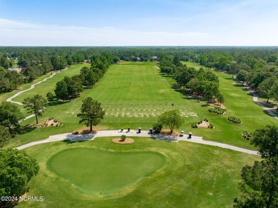This large 0.65 acre wooded estate homesite is located in ''The on River Landing Golf Course in North Carolina - for sale on GolfHomes.com, golf home, golf lot