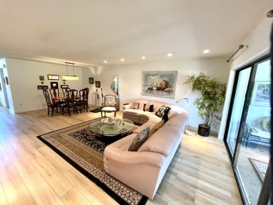 Welcome to this FRESHLY PAINTED  spacious first-floor retreat at on Hunters Run Golf and Country Club in Florida - for sale on GolfHomes.com, golf home, golf lot