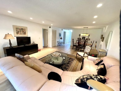 Welcome to this FRESHLY PAINTED  spacious first-floor retreat at on Hunters Run Golf and Country Club in Florida - for sale on GolfHomes.com, golf home, golf lot