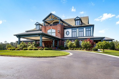 This large 0.65 acre wooded estate homesite is located in ''The on River Landing Golf Course in North Carolina - for sale on GolfHomes.com, golf home, golf lot