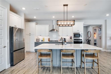 STUNNING 2104 sq/ft., 2-BDRM, 2-BTH + FLEX/OFFICE HOME IS on On Top of the World Golf Course in Florida - for sale on GolfHomes.com, golf home, golf lot