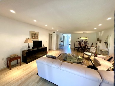 Welcome to this FRESHLY PAINTED  spacious first-floor retreat at on Hunters Run Golf and Country Club in Florida - for sale on GolfHomes.com, golf home, golf lot
