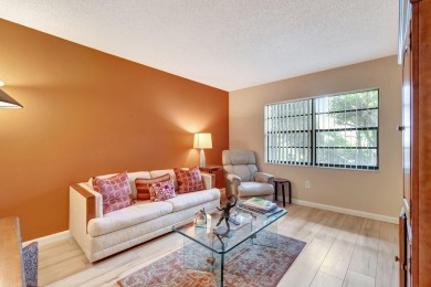 Welcome to this FRESHLY PAINTED  spacious first-floor retreat at on Hunters Run Golf and Country Club in Florida - for sale on GolfHomes.com, golf home, golf lot