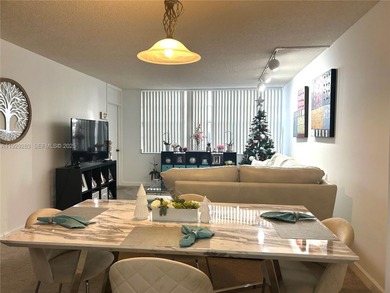 Spacious and well-maintained 1-bedroom, 1.5-bath condo located on Pembroke Lakes Golf Club in Florida - for sale on GolfHomes.com, golf home, golf lot