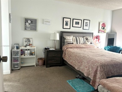 Spacious and well-maintained 1-bedroom, 1.5-bath condo located on Pembroke Lakes Golf Club in Florida - for sale on GolfHomes.com, golf home, golf lot