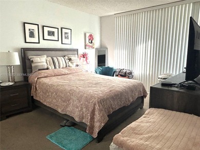 Spacious and well-maintained 1-bedroom, 1.5-bath condo located on Pembroke Lakes Golf Club in Florida - for sale on GolfHomes.com, golf home, golf lot