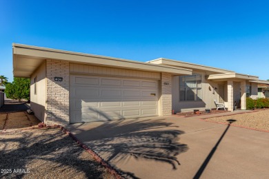 This lovely Sun City home is light & bright with an open concept on PalmBrook Country Club in Arizona - for sale on GolfHomes.com, golf home, golf lot