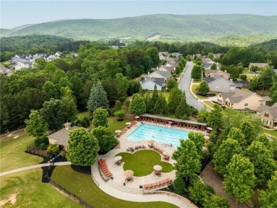 This amazing home with beautiful mountain views is nestled in a on The Highlands Course at Lake Arrowhead in Georgia - for sale on GolfHomes.com, golf home, golf lot