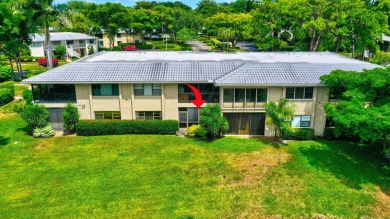 Welcome to this FRESHLY PAINTED  spacious first-floor retreat at on Hunters Run Golf and Country Club in Florida - for sale on GolfHomes.com, golf home, golf lot