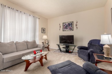 This lovely Sun City home is light & bright with an open concept on PalmBrook Country Club in Arizona - for sale on GolfHomes.com, golf home, golf lot