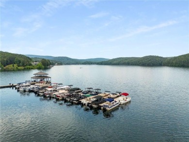 This amazing home with beautiful mountain views is nestled in a on The Highlands Course at Lake Arrowhead in Georgia - for sale on GolfHomes.com, golf home, golf lot