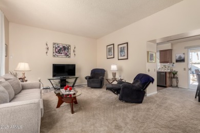 This lovely Sun City home is light & bright with an open concept on PalmBrook Country Club in Arizona - for sale on GolfHomes.com, golf home, golf lot