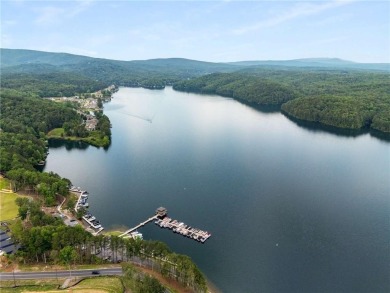 This amazing home with beautiful mountain views is nestled in a on The Highlands Course at Lake Arrowhead in Georgia - for sale on GolfHomes.com, golf home, golf lot
