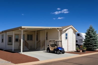 Charming 1 bed, 1 bath park model in the desirable 55+ community on Juniper Ridge R.V. Golf Resort in Arizona - for sale on GolfHomes.com, golf home, golf lot