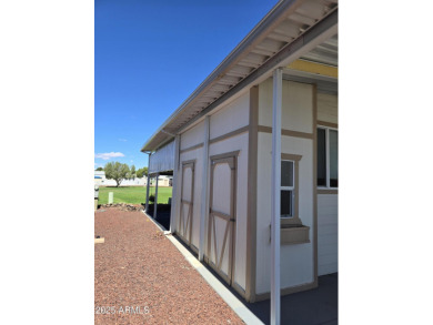 Charming 1 bed, 1 bath park model in the desirable 55+ community on Juniper Ridge R.V. Golf Resort in Arizona - for sale on GolfHomes.com, golf home, golf lot