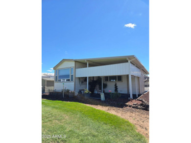 Charming 1 bed, 1 bath park model in the desirable 55+ community on Juniper Ridge R.V. Golf Resort in Arizona - for sale on GolfHomes.com, golf home, golf lot