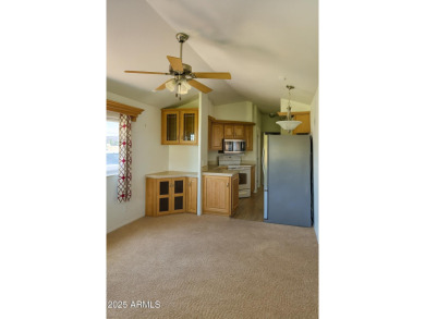 Charming 1 bed, 1 bath park model in the desirable 55+ community on Juniper Ridge R.V. Golf Resort in Arizona - for sale on GolfHomes.com, golf home, golf lot