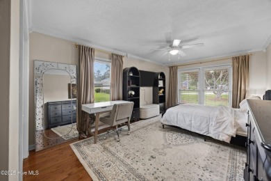 Discover this inviting brick ranch nestled on a serene .48-acre on River Bend Golf and Country Club in North Carolina - for sale on GolfHomes.com, golf home, golf lot
