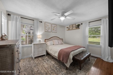 Discover this inviting brick ranch nestled on a serene .48-acre on River Bend Golf and Country Club in North Carolina - for sale on GolfHomes.com, golf home, golf lot