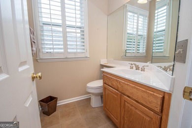 Welcome to this gorgeous brick Traditional with fabulous golf on Braelinn Golf Club in Georgia - for sale on GolfHomes.com, golf home, golf lot