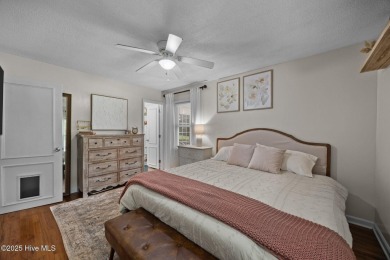 Discover this inviting brick ranch nestled on a serene .48-acre on River Bend Golf and Country Club in North Carolina - for sale on GolfHomes.com, golf home, golf lot
