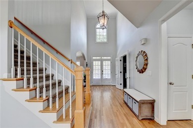 Welcome to this beautifully maintained 5-bedroom, 3-bath home on Hamilton Mill Golf Club in Georgia - for sale on GolfHomes.com, golf home, golf lot