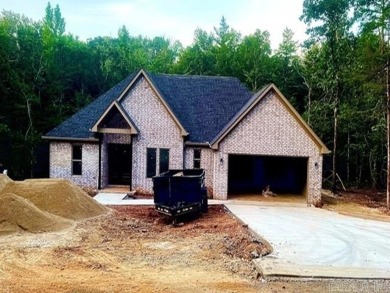 Brand new 1885 square foot home on lovely lot. Trees surround on Ponce De Leon Golf Course in Arkansas - for sale on GolfHomes.com, golf home, golf lot