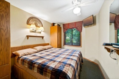 The Woodview unit boasts a prime spot right by the Navigator on Alpine Resort and Golf Course in Wisconsin - for sale on GolfHomes.com, golf home, golf lot