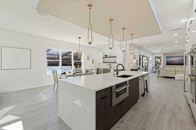 This exceptional waterfront residence, built in 2023, delivers a on The Renaisssance Vinoy Golf Club in Florida - for sale on GolfHomes.com, golf home, golf lot