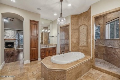 Quality, design, location...this gorgeous estate in prestigious on  in Nevada - for sale on GolfHomes.com, golf home, golf lot