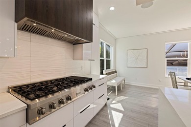 This exceptional waterfront residence, built in 2023, delivers a on The Renaisssance Vinoy Golf Club in Florida - for sale on GolfHomes.com, golf home, golf lot