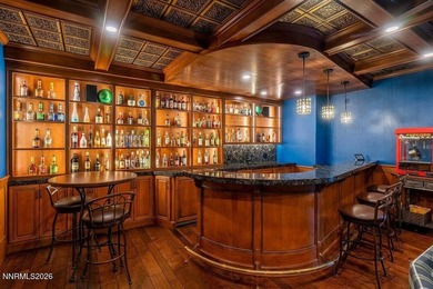 Quality, design, location...this gorgeous estate in prestigious on  in Nevada - for sale on GolfHomes.com, golf home, golf lot