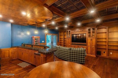 Quality, design, location...this gorgeous estate in prestigious on  in Nevada - for sale on GolfHomes.com, golf home, golf lot