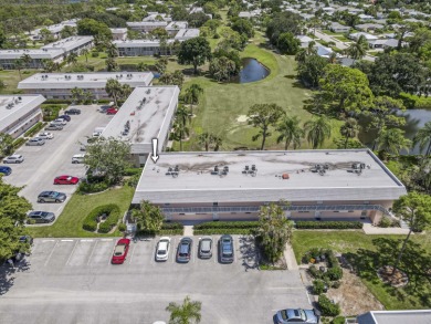 Terrific 55+ living! Extra bright end unit in popular Little on The Little Club in Florida - for sale on GolfHomes.com, golf home, golf lot