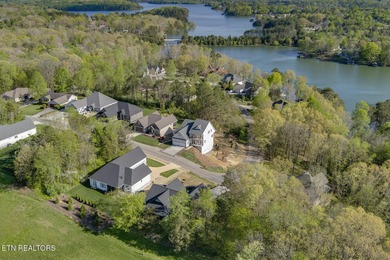 Located on a professionally landscaped corner lot in Tellico on Toqua Golf Course - Loudon County in Tennessee - for sale on GolfHomes.com, golf home, golf lot