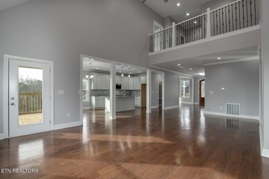 Located on a professionally landscaped corner lot in Tellico on Toqua Golf Course - Loudon County in Tennessee - for sale on GolfHomes.com, golf home, golf lot