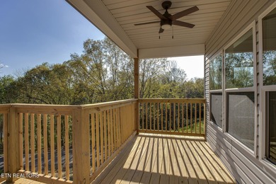 Located on a professionally landscaped corner lot in Tellico on Toqua Golf Course - Loudon County in Tennessee - for sale on GolfHomes.com, golf home, golf lot