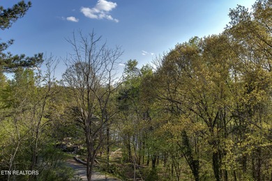 Located on a professionally landscaped corner lot in Tellico on Toqua Golf Course - Loudon County in Tennessee - for sale on GolfHomes.com, golf home, golf lot