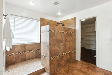 Golfing anyone?  Don't miss out on this opportunity to live in on Seville Golf and Country Club in Arizona - for sale on GolfHomes.com, golf home, golf lot