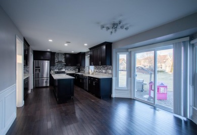 Welcome to this beautifully updated single-family home in the on Stonebridge Golf Club in Michigan - for sale on GolfHomes.com, golf home, golf lot