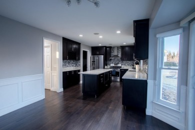 Welcome to this beautifully updated single-family home in the on Stonebridge Golf Club in Michigan - for sale on GolfHomes.com, golf home, golf lot
