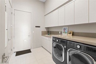 Perched in the prestigious MacDonald Highlands, this luxury on Dragon Ridge Country Club in Nevada - for sale on GolfHomes.com, golf home, golf lot