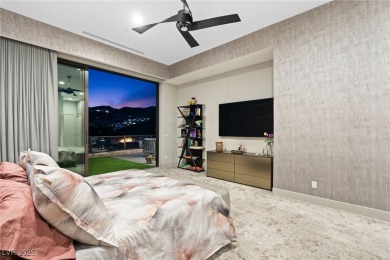 Perched in the prestigious MacDonald Highlands, this luxury on Dragon Ridge Country Club in Nevada - for sale on GolfHomes.com, golf home, golf lot