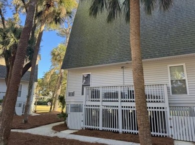 1st Floor exterior villa is privately located on #18th tee box on The Plantation Course At Edisto in South Carolina - for sale on GolfHomes.com, golf home, golf lot