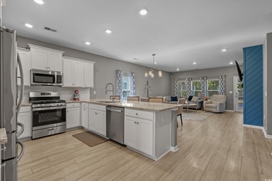 Discover coastal living at its finest in this spacious and on Pine Lakes Country Club in South Carolina - for sale on GolfHomes.com, golf home, golf lot