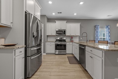 Discover coastal living at its finest in this spacious and on Pine Lakes Country Club in South Carolina - for sale on GolfHomes.com, golf home, golf lot