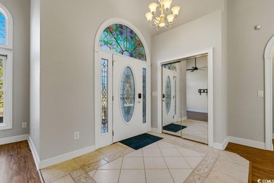 Discover this beautifully crafted custom all-brick home offering on Long Bay Club in South Carolina - for sale on GolfHomes.com, golf home, golf lot