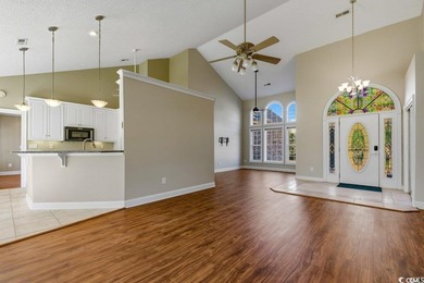 Discover this beautifully crafted custom all-brick home offering on Long Bay Club in South Carolina - for sale on GolfHomes.com, golf home, golf lot