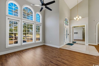 Discover this beautifully crafted custom all-brick home offering on Long Bay Club in South Carolina - for sale on GolfHomes.com, golf home, golf lot
